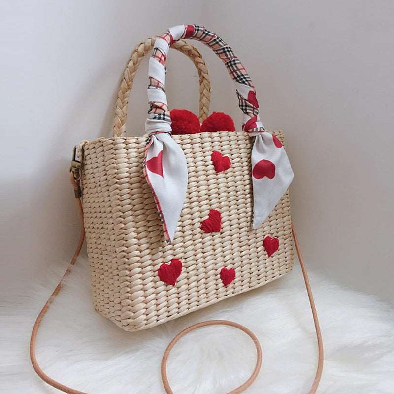 Bolsa Pequena de Palha Artesanal Decorada em Coração Praia