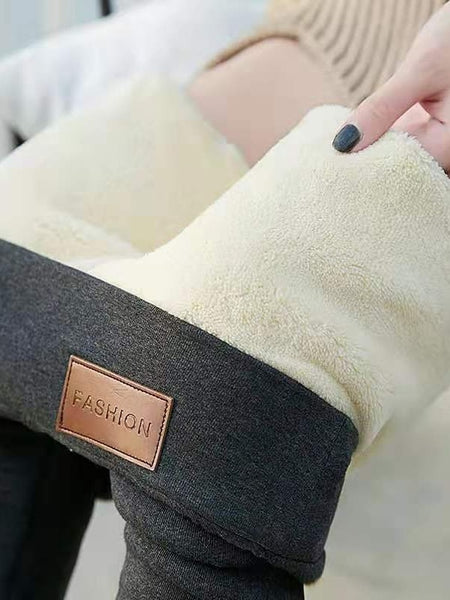 Calça legging feminina forrada com lã sintética e algodão, modelagem ajustada, térmica, ideal para o inverno.