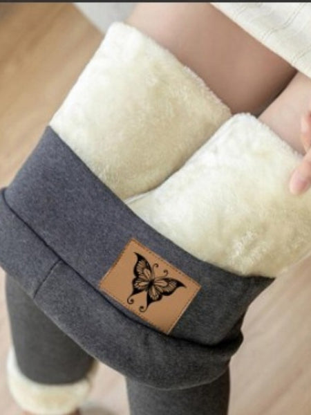 Calça legging feminina forrada com lã sintética e algodão, modelagem ajustada, térmica, ideal para o inverno.