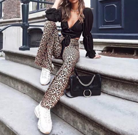 Calça Flare De Malha Leopardo Cintura Alta