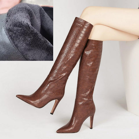 High-heeled leather boots with thin heels