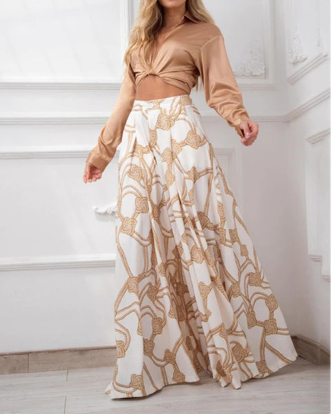 Conjunto Calça Pantalona Estampada e Cropped Manga Longa Decote V